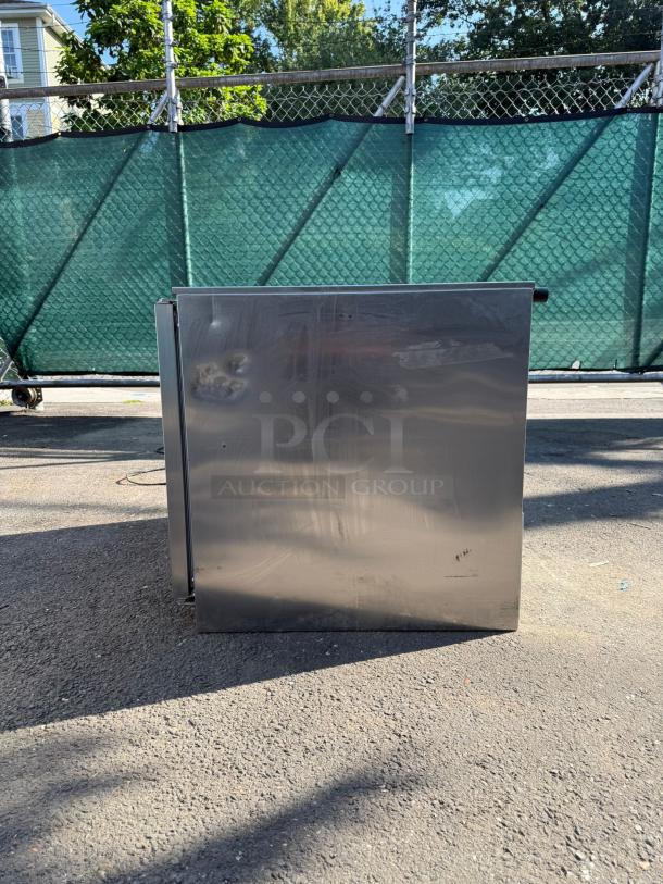 Beverage-Air UCR36AHC-23 undercounter refrigerator, stainless steel, side view. Used condition with visible surface marks.