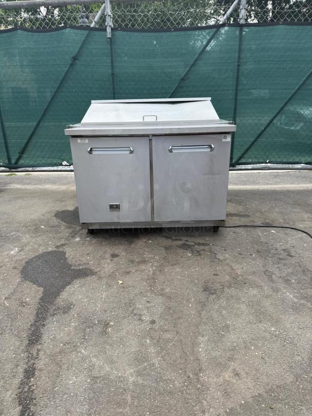 Kelvinator KCHMT48.18 48" commercial prep table, mega top, refrigerated base, 115v, dual doors, in good condition.