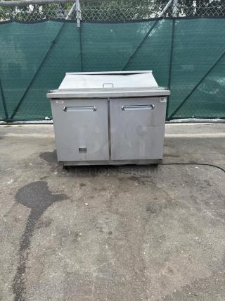 Kelvinator KCHMT48.18 48" commercial prep table, mega top, refrigerated base, 115v, dual doors, in good condition.