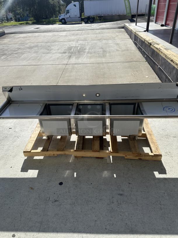 Brand new Regency 124" 16 gauge stainless steel commercial sink, three compartments, 2 drainboards, model 60031717224.