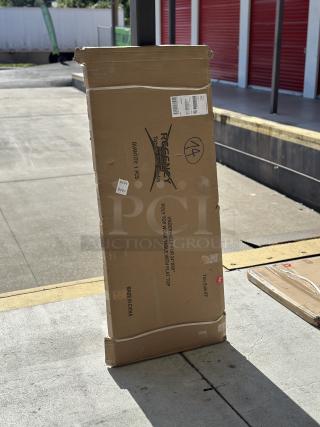 Regency 18 Gauge Stainless Steel Shelf for 24"x60" Table, model 600UTP2460S, in original packaging with minor dents.