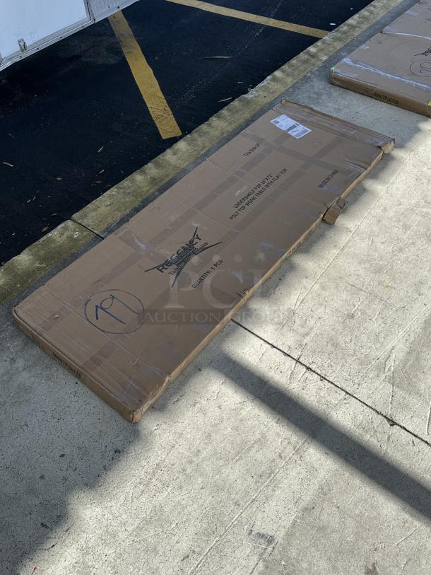 Brand new Regency 18-gauge stainless steel adjustable shelf, model 600UTP2472S, in scratch and dent condition, boxed.