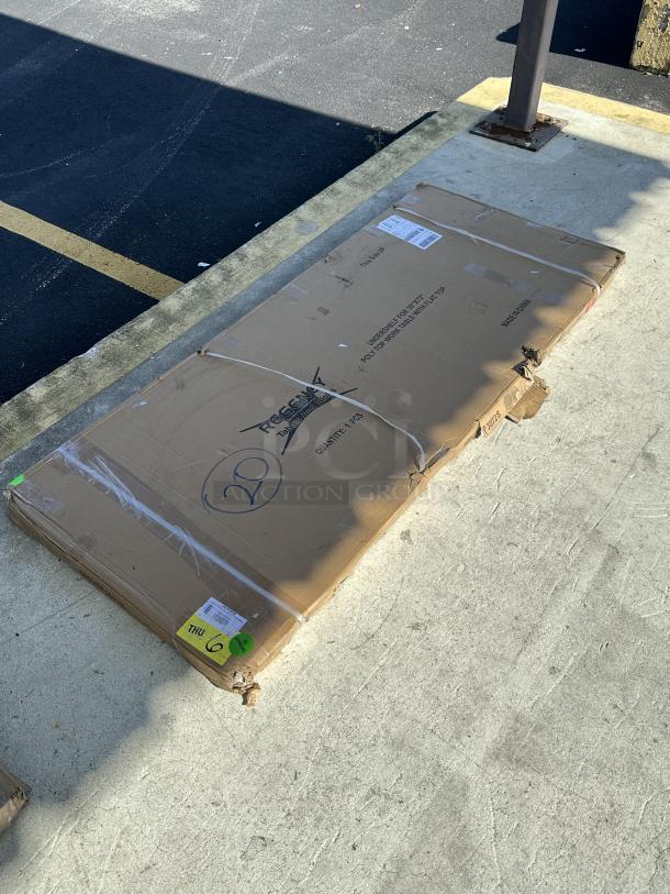 Brand new Regency 18 gauge stainless steel adjustable shelf, model 600UTP3072S, in original packaging with some dents.