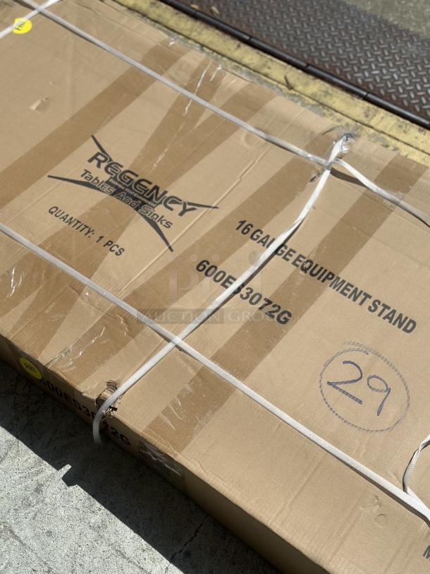 Regency 30"x72" stainless steel equipment stand, model 600ES3072G, in original packaging, labels indicate 16-gauge steel.