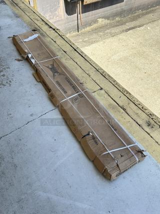 Regency 16 Gauge 12" x 96" stainless steel wall shelf, model 600WS1296HD, new with minor box damage.