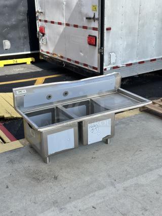 Brand new Regency sink component, model 600S2162018R, with right drainboard. Visible scratches and dents.