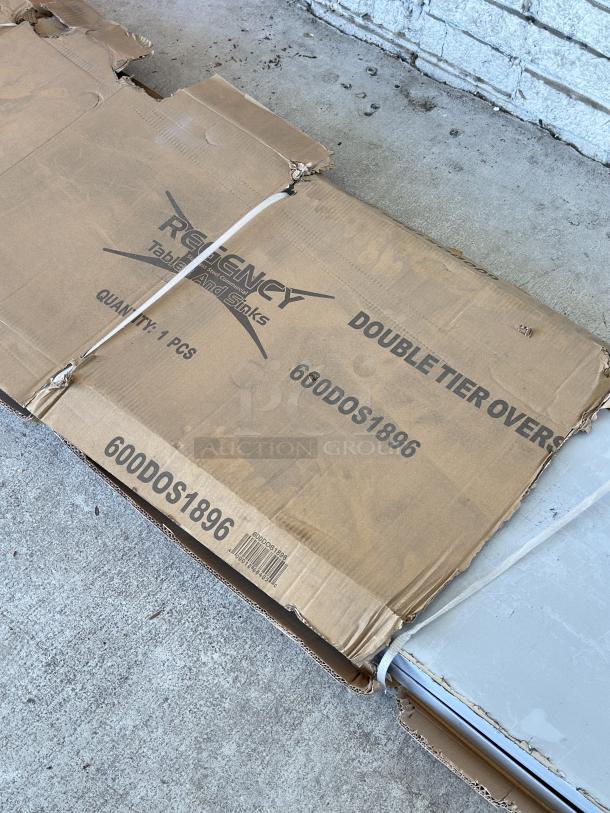 Regency stainless steel double deck overshelf, Model 600DOS1896, 18"x96"x32", new condition with scratches, in original packaging.