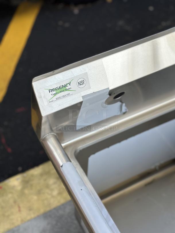 Brand new Regency 600S1182418R sink component with right drain board, scratch and dent condition, NSF certified.