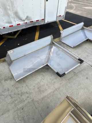 Brand new Regency 4' L-Shape dishtable, 16-gauge stainless steel, right island design, model 600CDTI48R, minor dents visible.