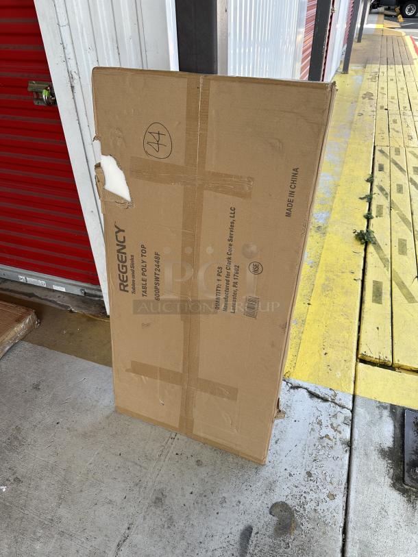 Regency 24"x48" poly tabletop, model 600PSWT2448F, new with scratch and dent, in original box with markings.