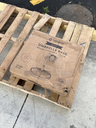 Lancaster Table & Seating 50 lb. concrete umbrella base, model 427BASECNR50, black, brand new, scratch and dent damage.