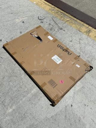 Cardboard box containing a Lancaster Table & Seating 30" x 48" laminated table top, slightly damaged. Model 3493048TCB visible.