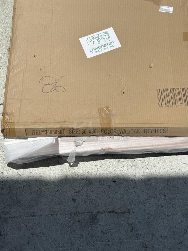 Brand new Lancaster Table & Seating 30"x30" laminated square table top, reversible walnut/oak, model 3493030T, in packaging.