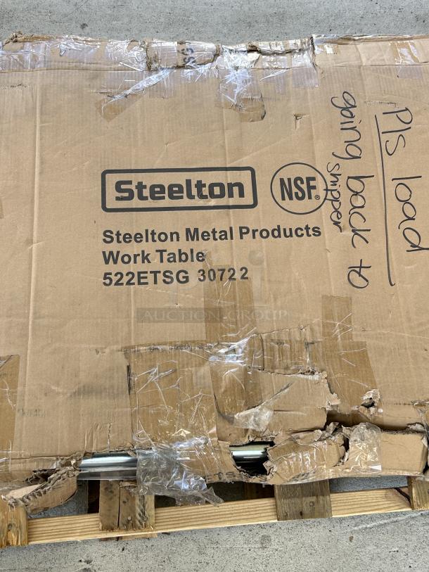 Steelton 30" x 72" 18 Gauge 430 Stainless Steel Work Table, model 522ETSG30722, in damaged packaging.
