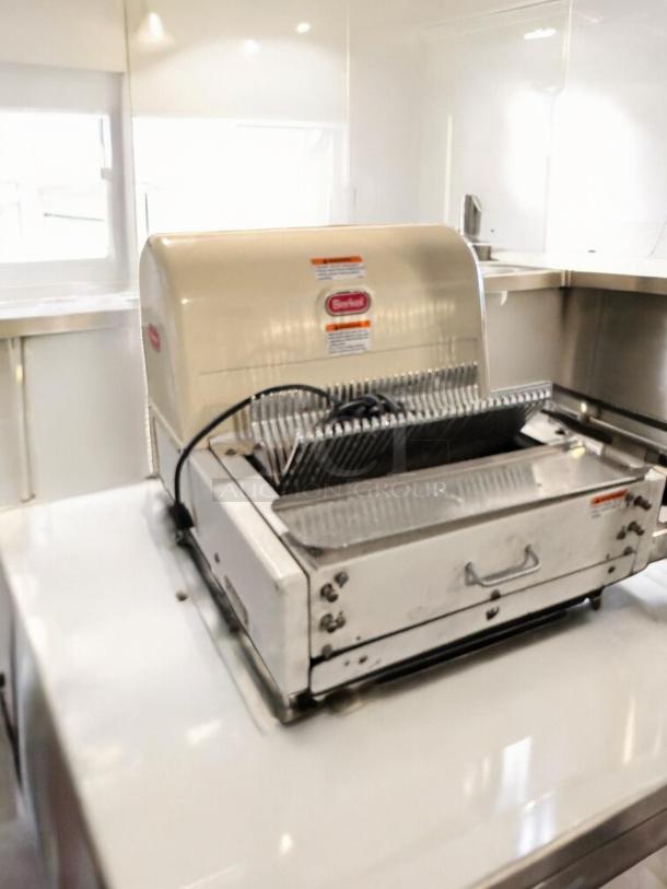 Berkel MB 1/2 bread slicer, excellent condition, 115V, tested and working, with brand labels visible.