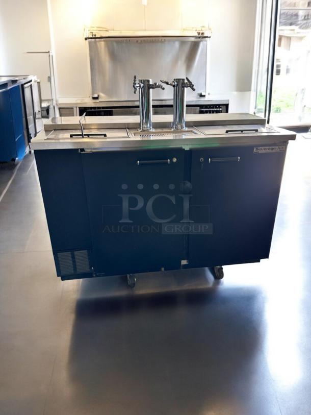Beverage-Air DD58C draft beer dispenser, excellent condition, two taps, black exterior, wheels, 115V, tested and working.