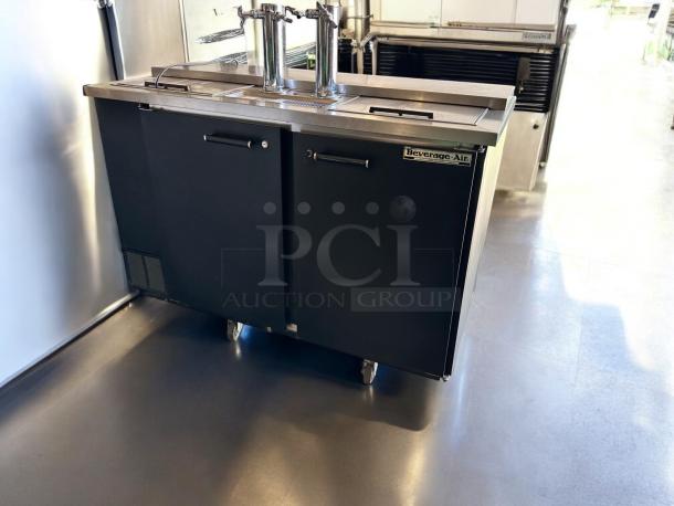 Beverage-Air DD58C draft beer dispenser in excellent condition. Features dual taps, stainless steel top, and branded label. Fully tested.