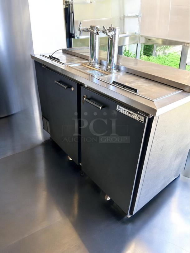 Beverage-Air DD58C draft beer dispenser in excellent condition, features dual taps, stainless steel top, and brand label, 115V.