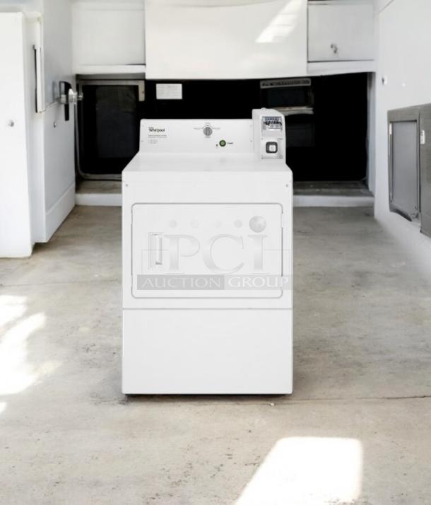 GE commercial electric dryer, model DCCD330ED2WC. Excellent condition, 240V, fully tested. White exterior, front-loading.