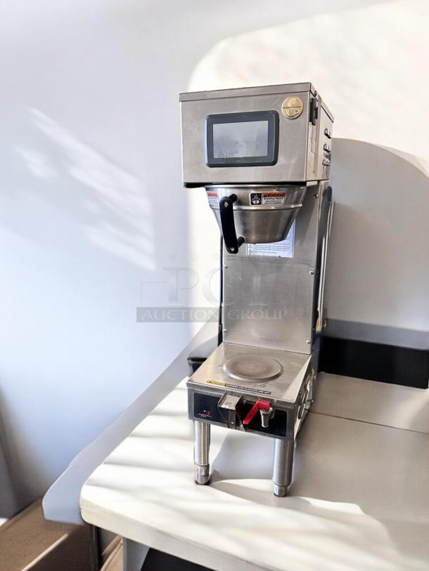 Curtis G4GEMS63A1000 single 1.5-gallon coffee brewer, excellent condition, tested, 120/220V, stainless steel design, touch controls.
