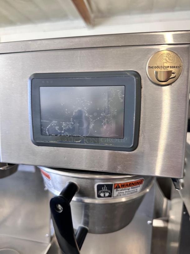 Curtis G4GEMS63A1000 coffee brewer, excellent condition, 1.5-gallon capacity, 120/220V, digital display, Gold Cup Series badge.