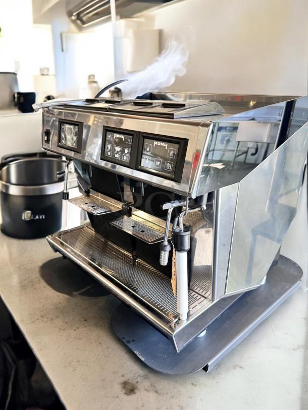 Pony Espresso PONY 4, 2-group commercial espresso machine, excellent condition, 220V, fully tested, sleek stainless steel design.