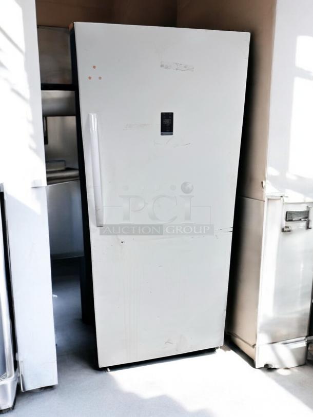 Insignia NS-UZ21WH0 21 Cu. Ft. Upright Freezer, excellent condition, 115V, white exterior, digital display, fully tested.