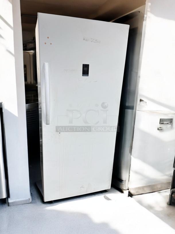 Insignia NS-UZ21WH0 21 Cu. Ft. Upright Freezer, excellent condition, 115V, white exterior, digital display, fully tested.