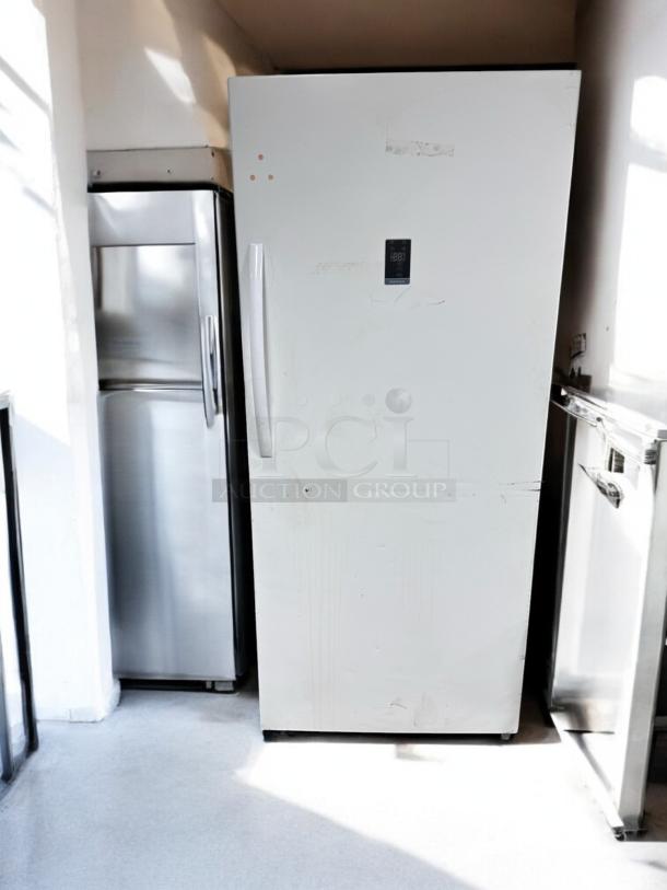 Insignia NS-UZ21WH0 21 Cu. Ft. upright freezer in excellent condition, 115V, fully tested and working.