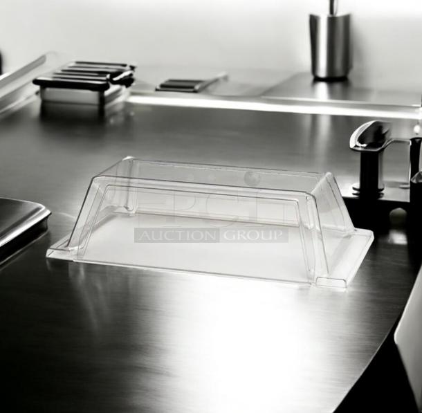 Brand new sneeze guard model 8A-45SG-1DA, single door, clear acrylic, tested and ready for use, on stainless surface.