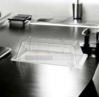 Brand new sneeze guard model 8A-45SG-1DA, single door, clear acrylic, tested and ready for use, on stainless surface.