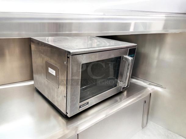 Sharp R-23GT-F commercial microwave oven, excellent condition, stainless steel, 208/230V, fully tested and working.