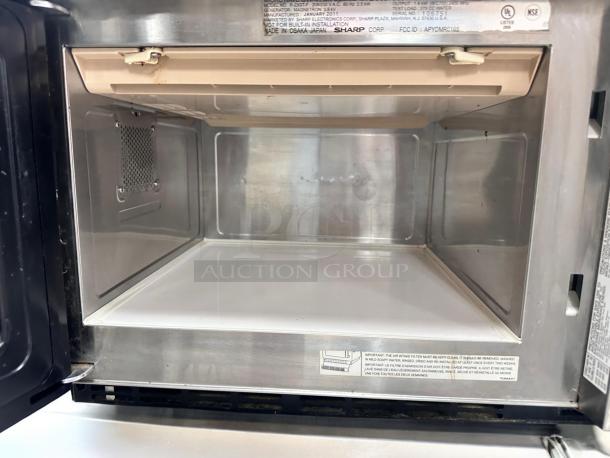 Sharp R-23GT-F Commercial Microwave Oven, excellent condition, 208/230V, fully tested and working, interior view.