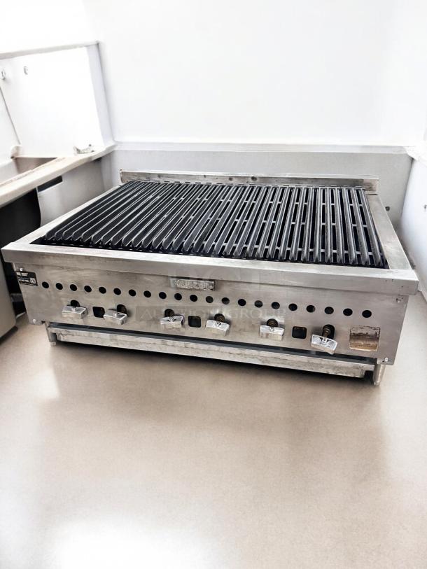 Vulcan 36" gas countertop charbroiler in excellent condition, features multiple control knobs, fully tested, uses natural gas.