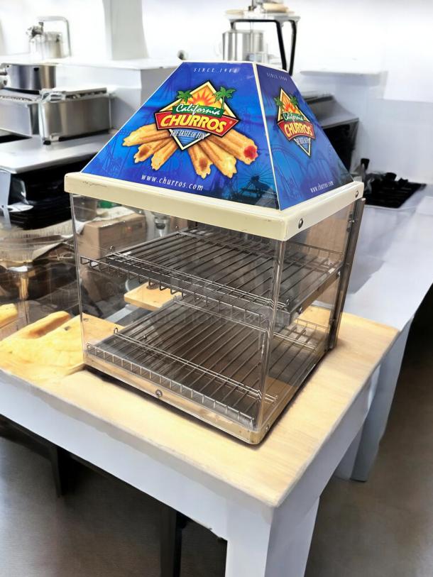 Wisco 680-1 food warmer/display cabinet in excellent condition, 120V, fully tested, with dual shelves and clear door.