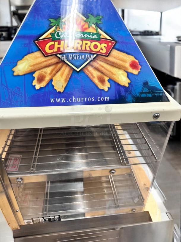 Wisco 680-1 food warmer/display cabinet, excellent condition, clear glass panels, metal shelves, 120V, churro branding.