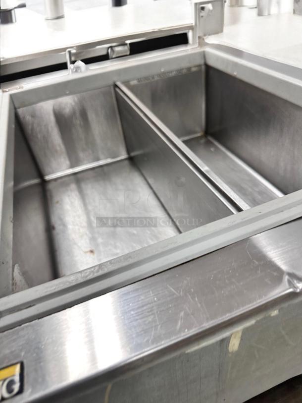 Wisco 680-1 countertop merchandising warmer in excellent condition, stainless steel, fully tested, 120V.