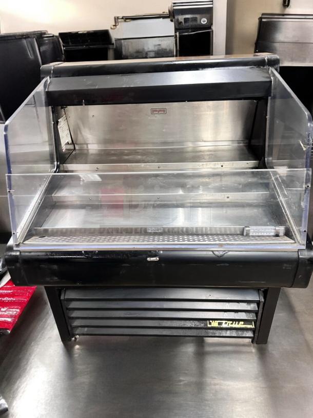 True THAC-36 refrigerated air curtain merchandiser in excellent condition, 115V, fully tested and working.