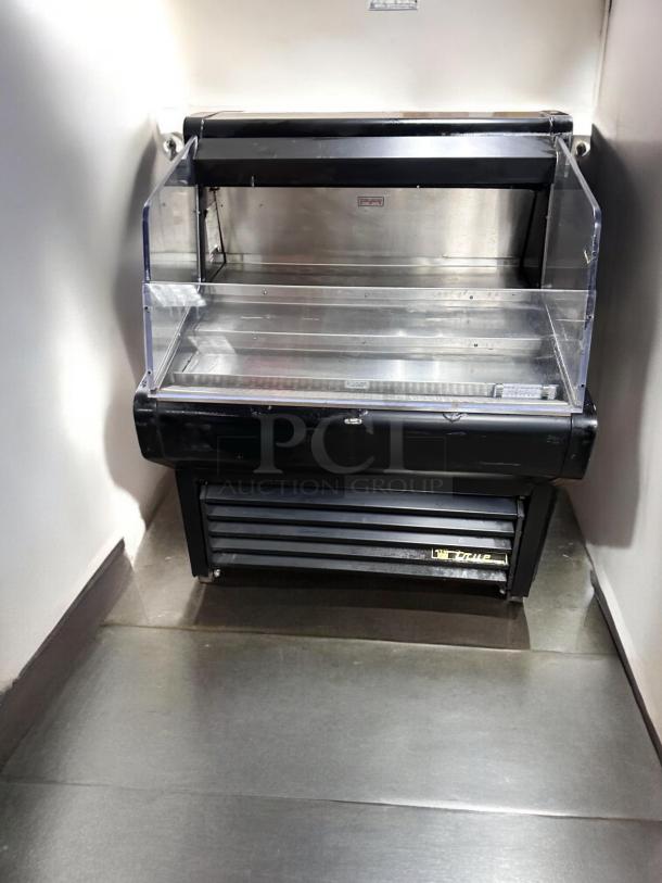 True THAC-36 refrigerated air curtain merchandiser in excellent condition, fully tested, 115V, by True Manufacturing Co., Inc.
