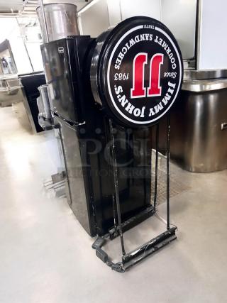 Double-sided LED Jimmy John’s sign by Magic Color, 25" diameter, 5' tall, excellent condition, fully tested and working.