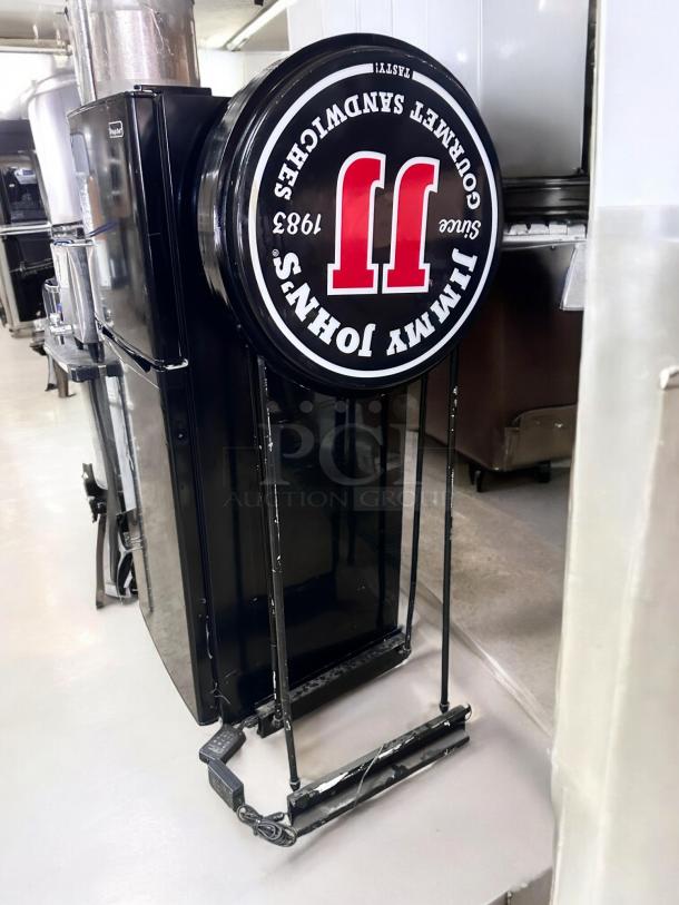 Jimmy John's LED sign, double-sided, 25" diameter, 5' tall. Magic Color model, excellent condition, tested and working.