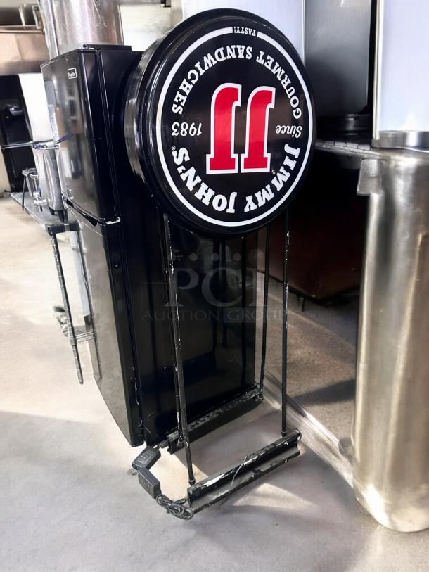 Double-sided LED sign, Jimmy John’s branded, 25" diameter, 5' tall, excellent condition, fully tested.