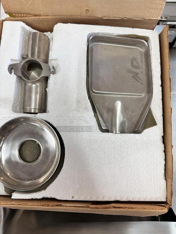Brand new Norwalk Model 235 hydraulic press juicer components in original packaging. Includes stainless steel parts, tagged "SY."