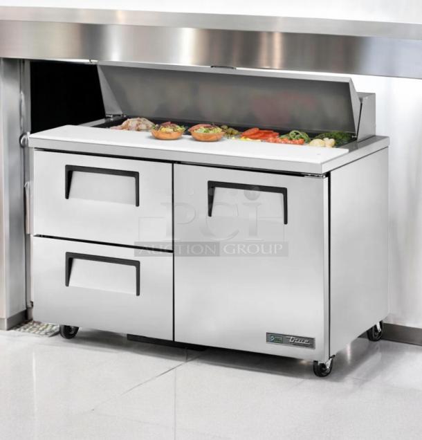 True TSSU-48-12D-2 sandwich/salad prep table in excellent condition, stainless steel, 48", 115V, fully tested, with two drawers.