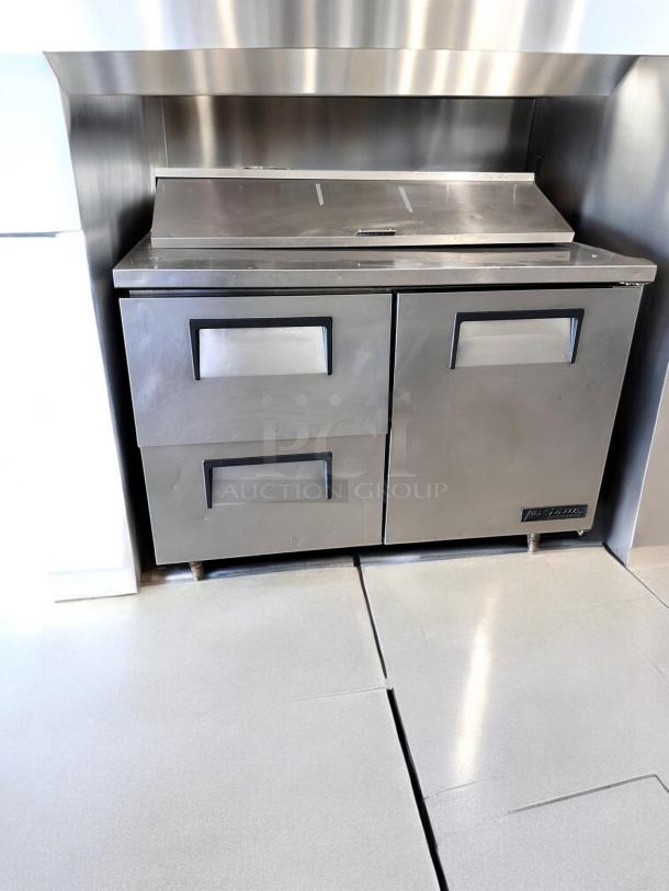 True TSSU-48-12D-2 sandwich prep table, excellent condition, stainless steel, 48", tested and working, 115V.