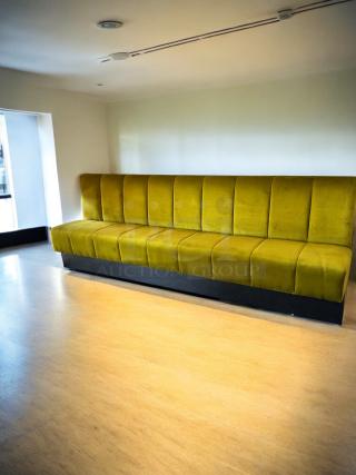 Custom upholstered banquette bench, 109"W x 35"D x 38"H, excellent condition, vibrant green fabric, fully cleaned.