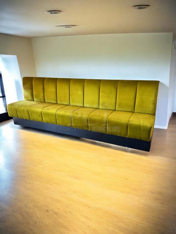 Custom upholstered banquette bench, 109"W x 35"D x 38"H, vibrant green fabric, excellent condition, ready for use.