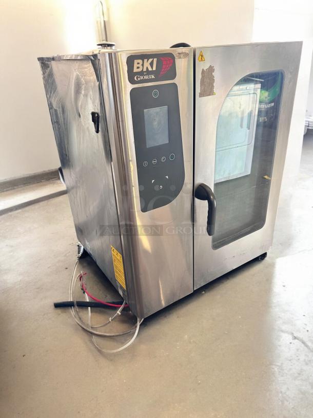 BKI by Giorik ABTE101R electric combi oven steamer, excellent condition, stainless steel, 208V 3Ph, fully tested and working.