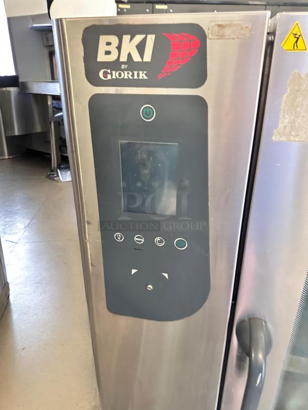 BKI by Giorik ABTE101R electric combi oven steamer, 208V 3Ph, stainless steel, control panel shown, excellent condition.