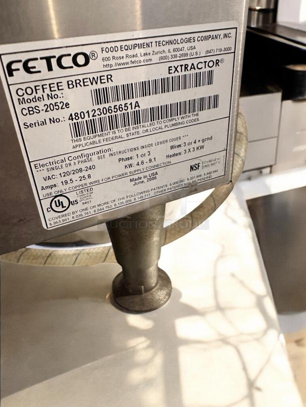 Fetco CBS-2052e Dual Station Coffee Brewer label, 208-240V, excellent condition, fully tested, NSF certified, serial 480123065651A.